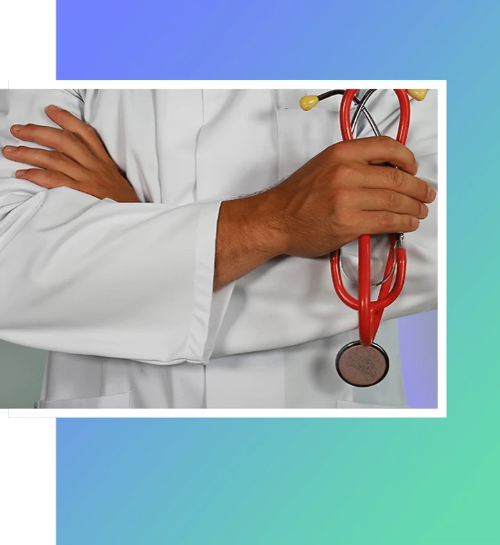 Doctor holding red stethoscope.